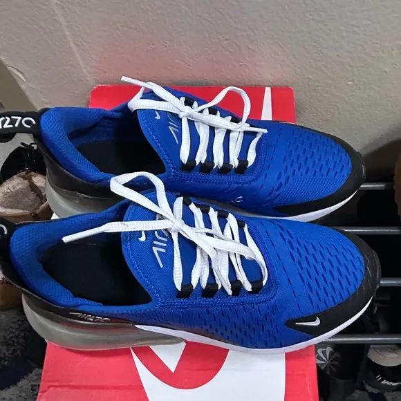 Blue and black Nike shoes