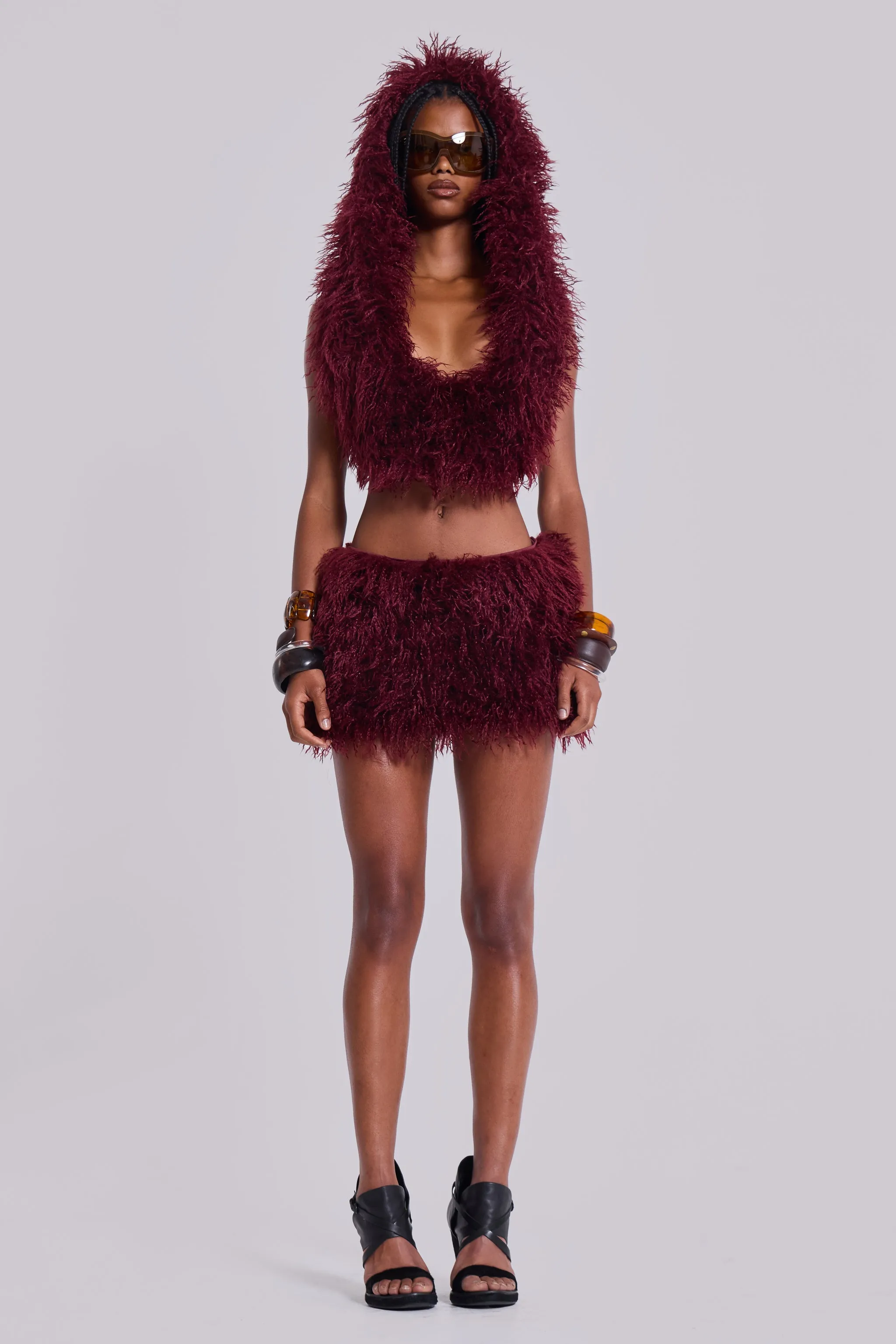 Haka Mongolian Faux Fur Backless Top in Wine